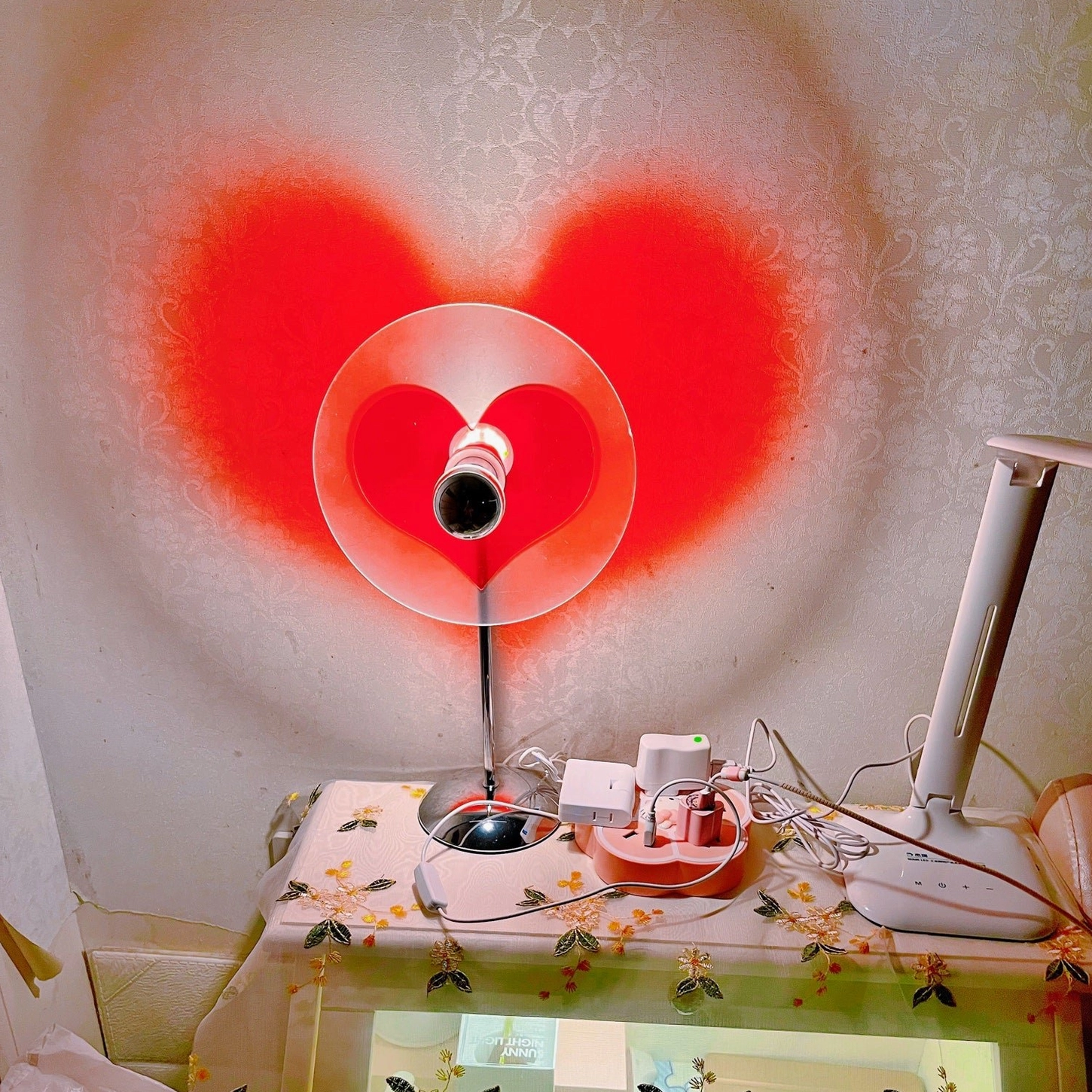 Heart projection lamp combining modernist form with emotional intention for personalized interior spaces