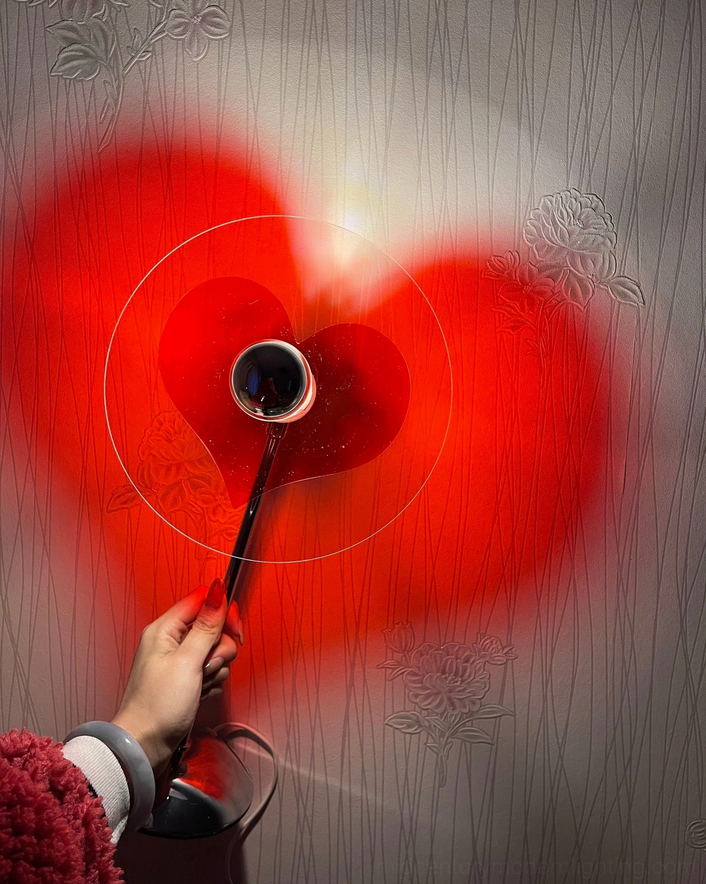 Heart projection table lamp positioned as romantic gift and bedroom decoration piece