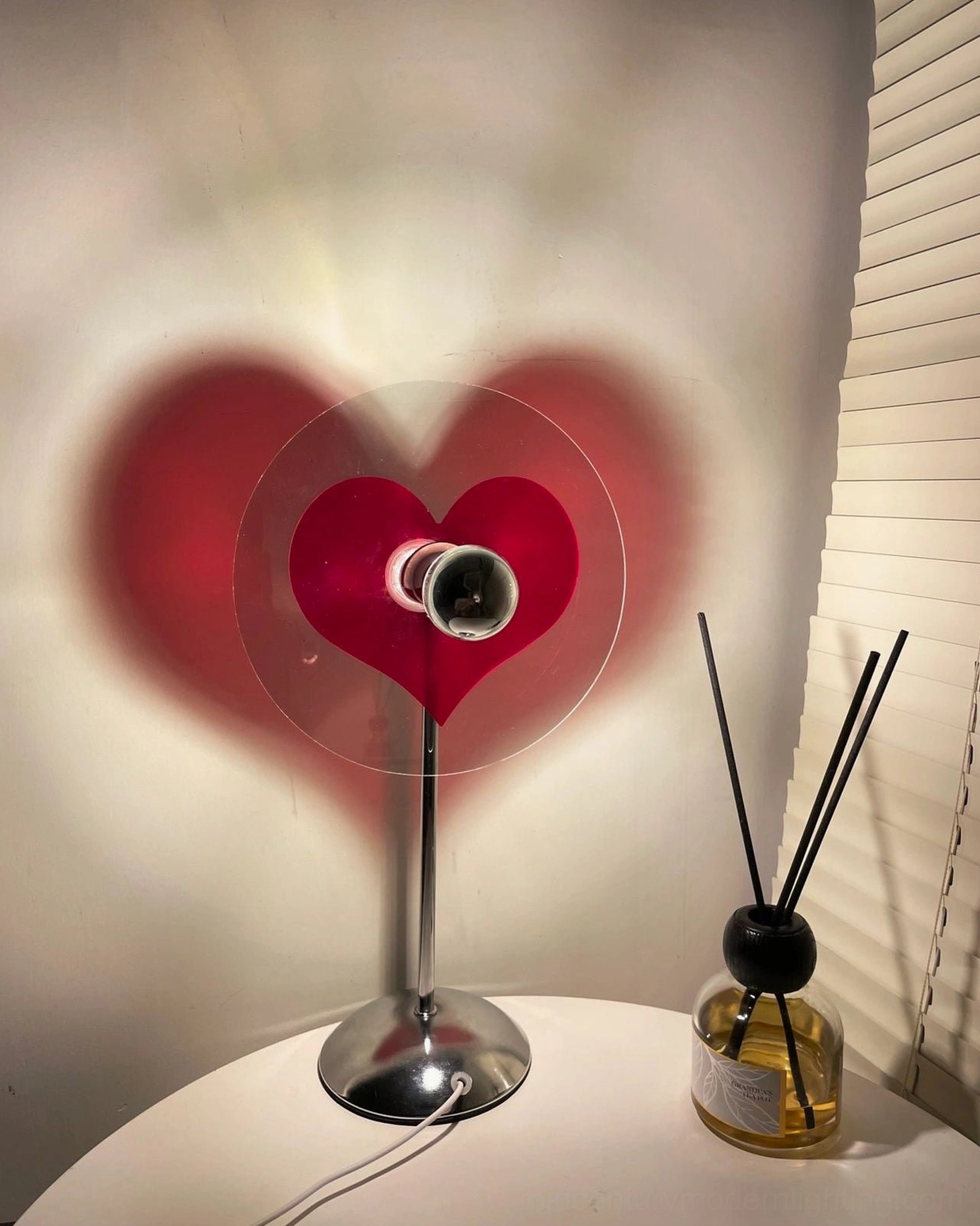 Heart projection lamp with included USB cable for convenient charging from any compatible power source