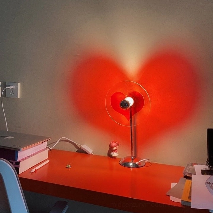 Heart projection lamp inspiring emotional well-being and productivity in modern work and home spaces