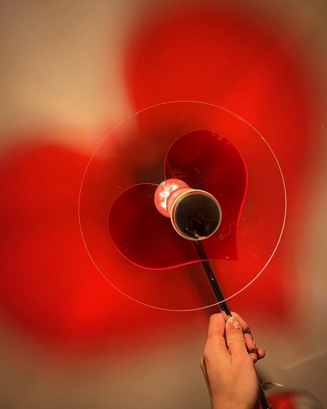 Heart-shaped table lamp with durable metal frame and precision-engineered optical acrylic components