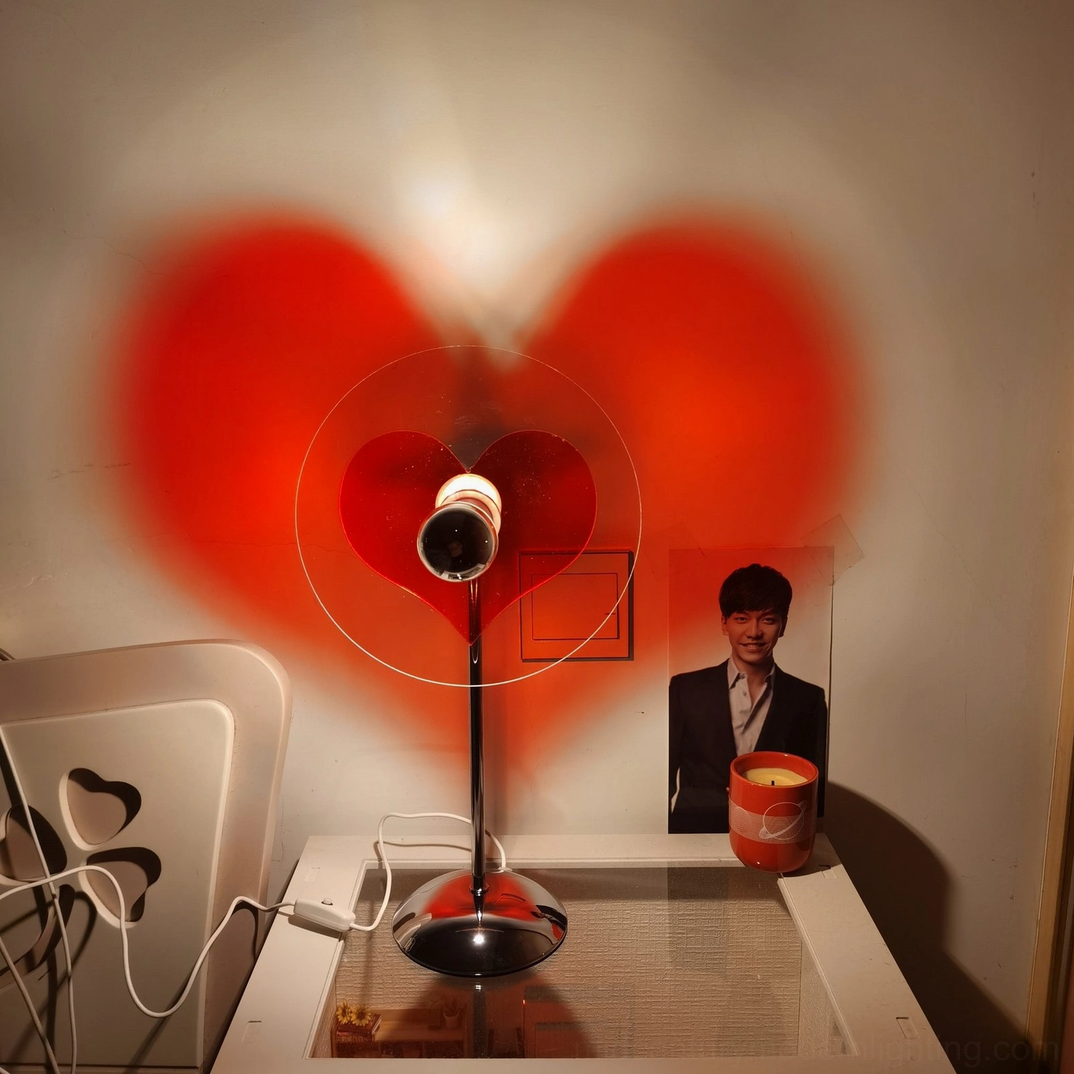 Heart-shaped LED lamp front view showing chrome frame and heart-shaped acrylic shade design