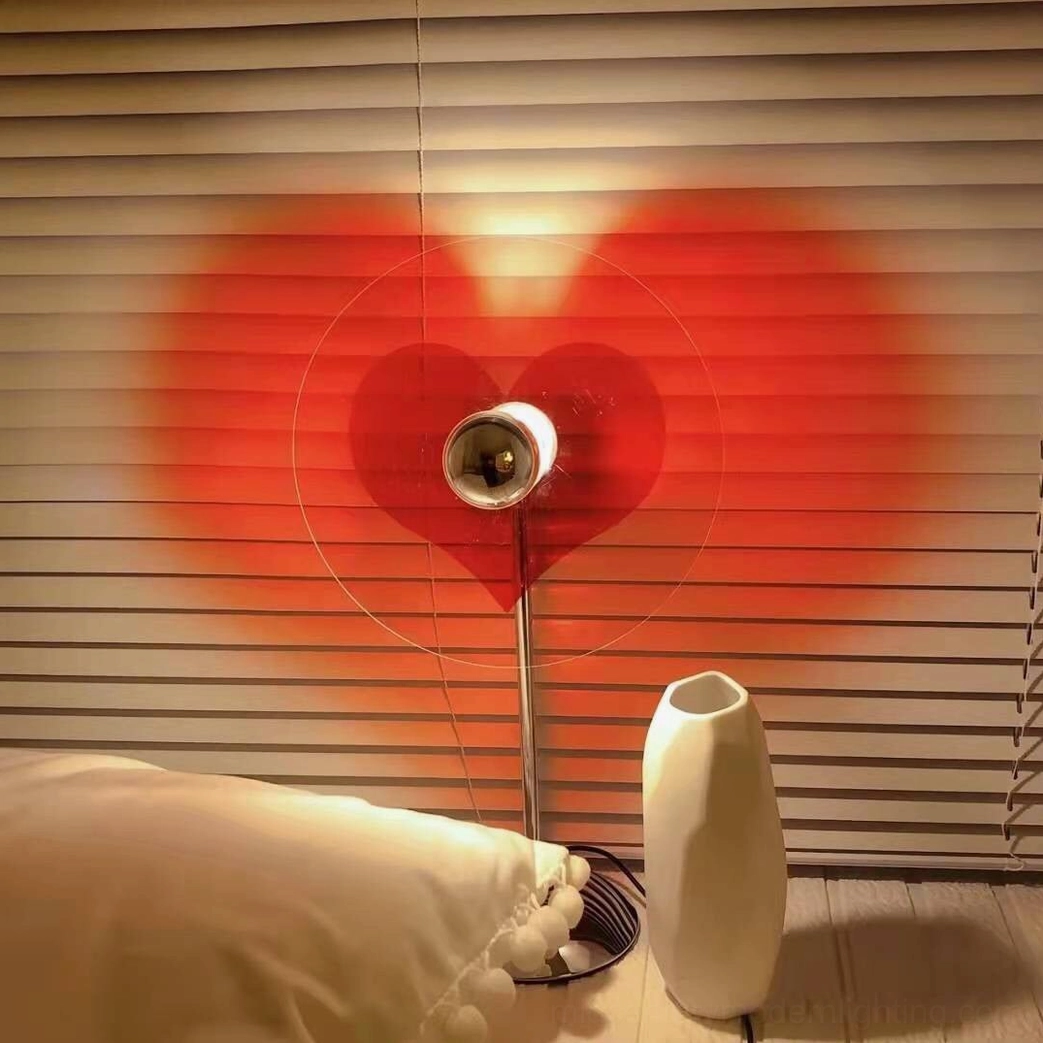 Heart-shaped table lamp in industrial loft and exposed brick environments with chrome metal accents