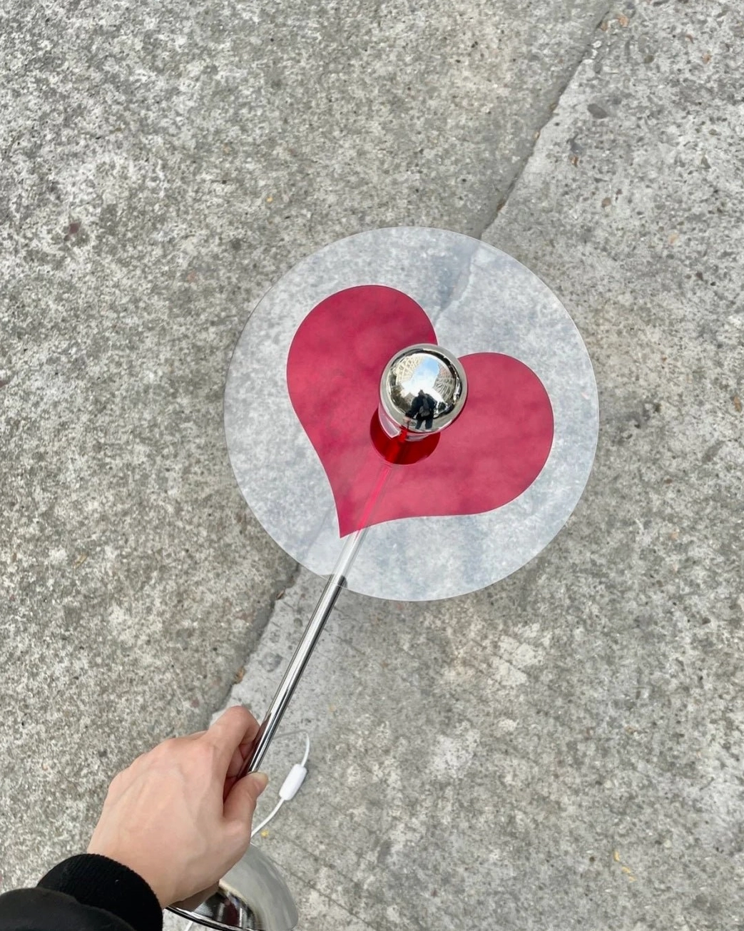 Heart-shaped table lamp transcending mass-produced décor with thoughtful and humanized design expression