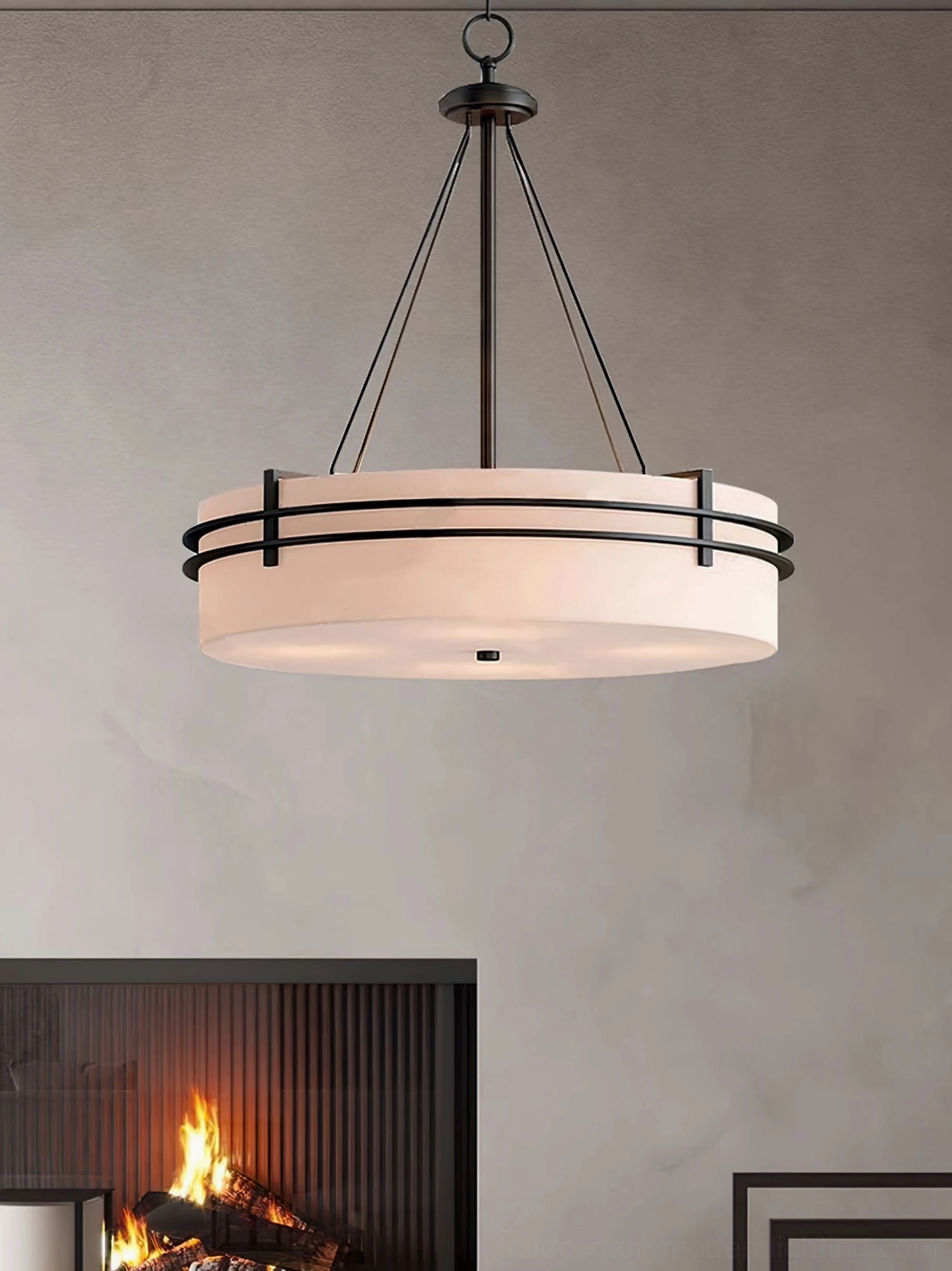 Modern Heddle pendant chandelier creating warm ambient lighting in living space