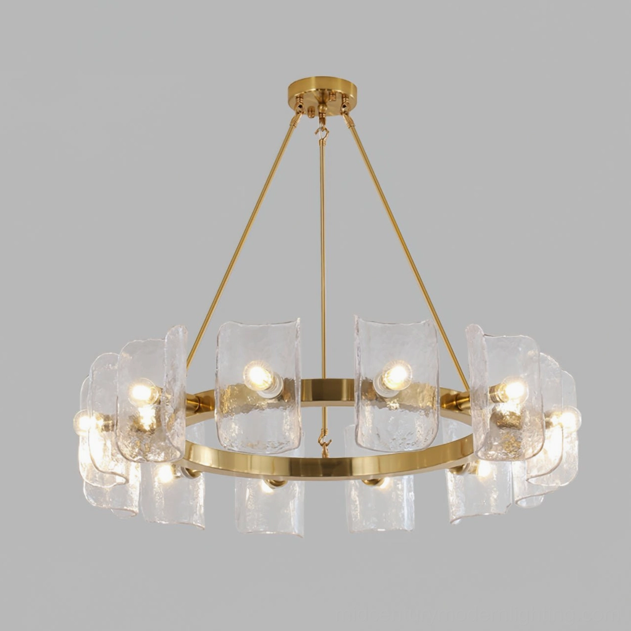 Close-up detail of Helios chandelier bulb configuration and textured glass shade diffuser