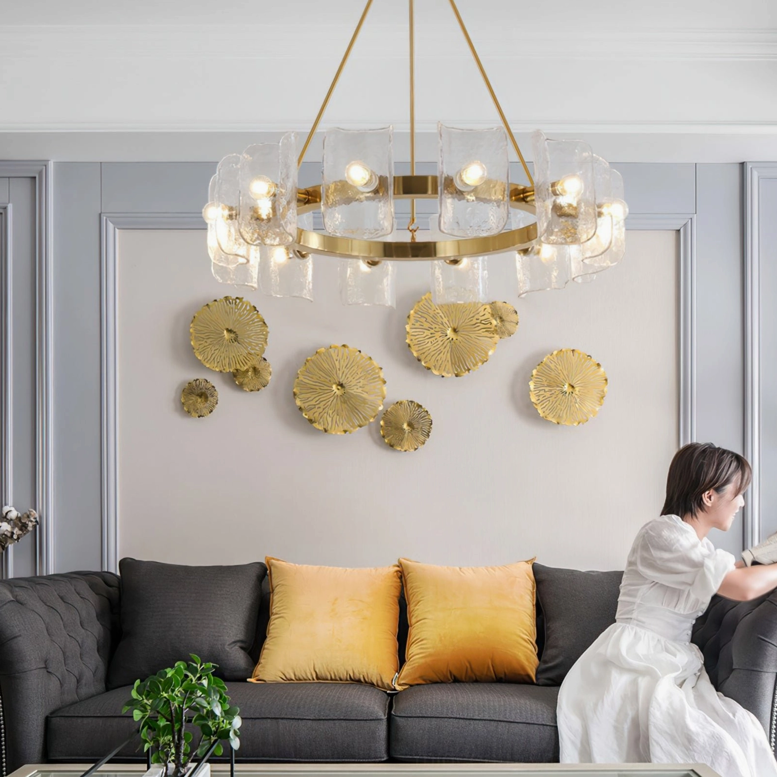 Helios ring chandelier in modern living room with contemporary furniture and neoclassical design elements