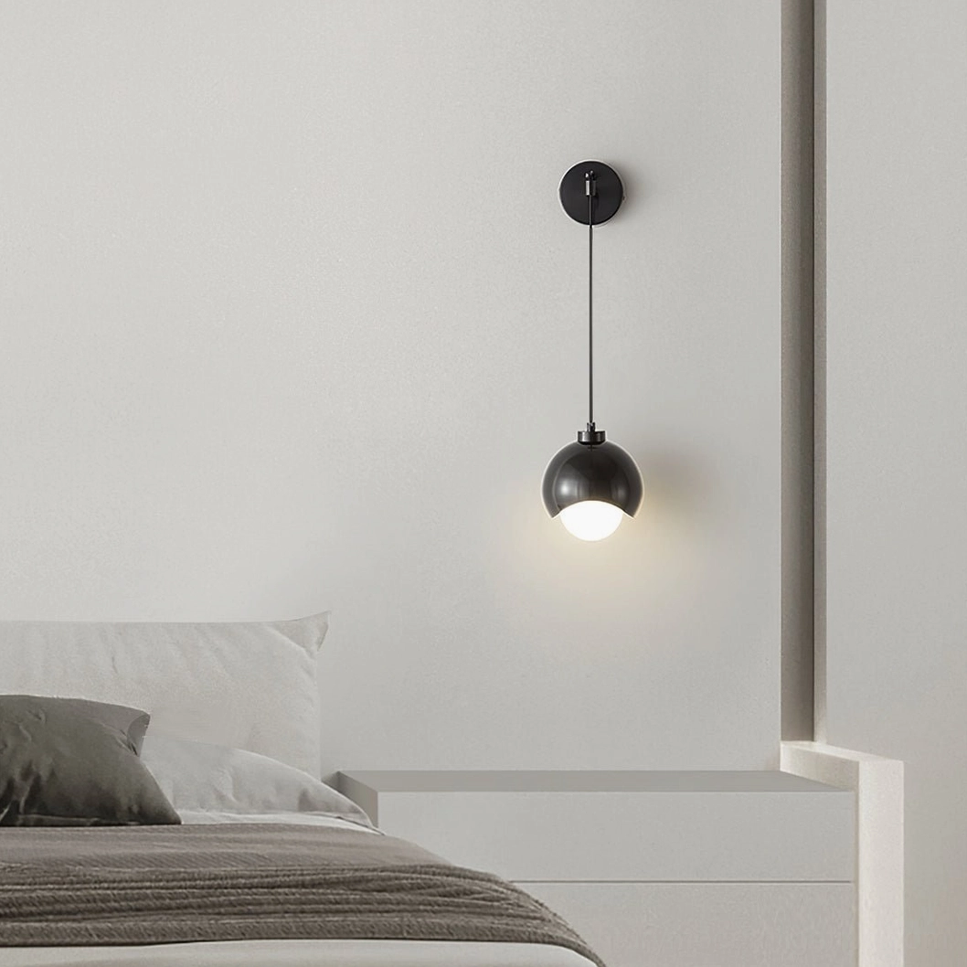 Helmet pendant wall sconce black in master bedroom with bed and dresser modern aesthetic