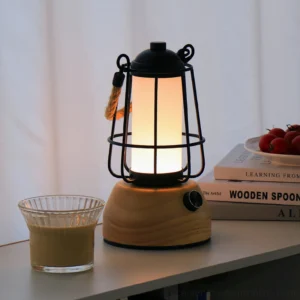 Mid-century modern hemp rope lantern lamp styled on bedroom desk with coffee cup and books for ambient lighting