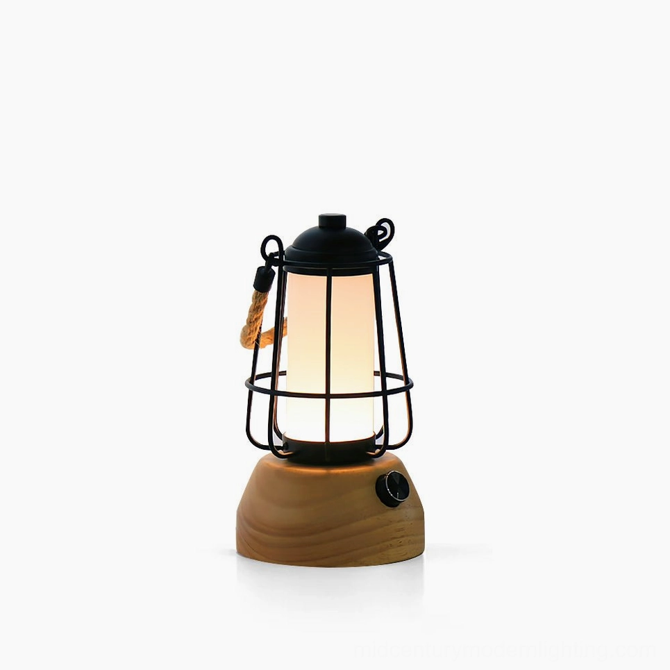 Hemp rope lantern portable LED table lamp with natural rope wrap and black metal frame on white studio background