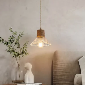Hemp rope glass pendant light illuminated in cozy living room interior, demonstrating warm ambient glow and wabi-sabi design aesthetic