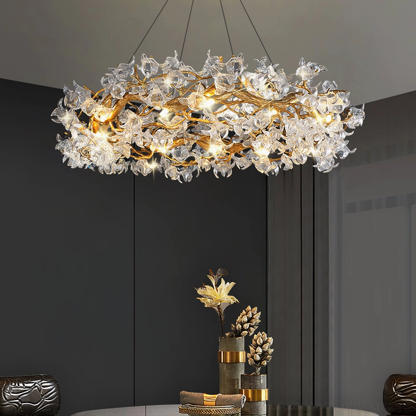 Hibiscus chandelier illuminating entryway creating dramatic warm golden light and welcoming atmosphere