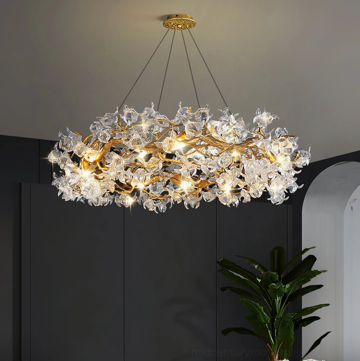 Contemporary hotel lobby featuring hibiscus chandelier with luxury ambiance and modern design