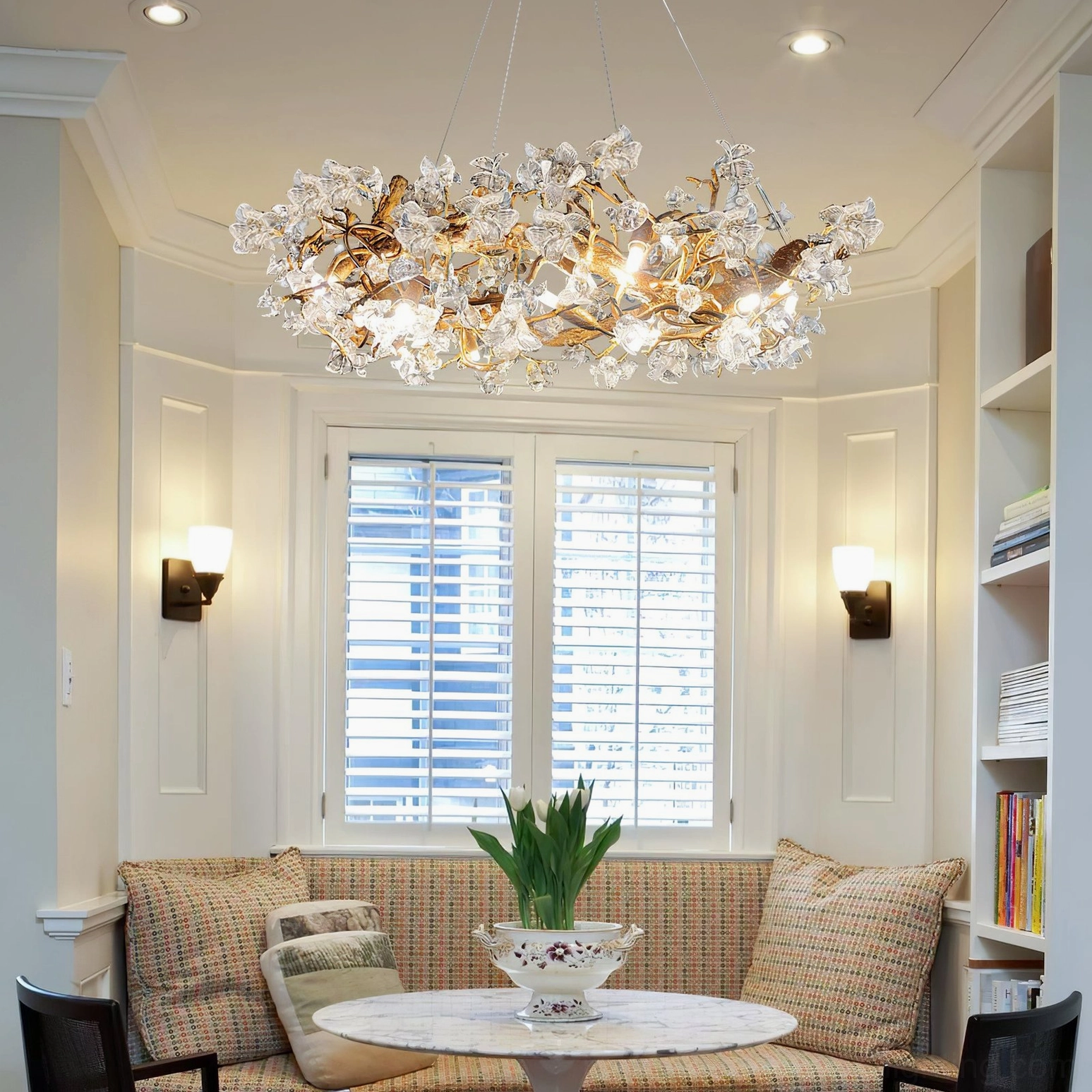 Minimalist living room with sculptural hibiscus crystal chandelier as architectural statement piece