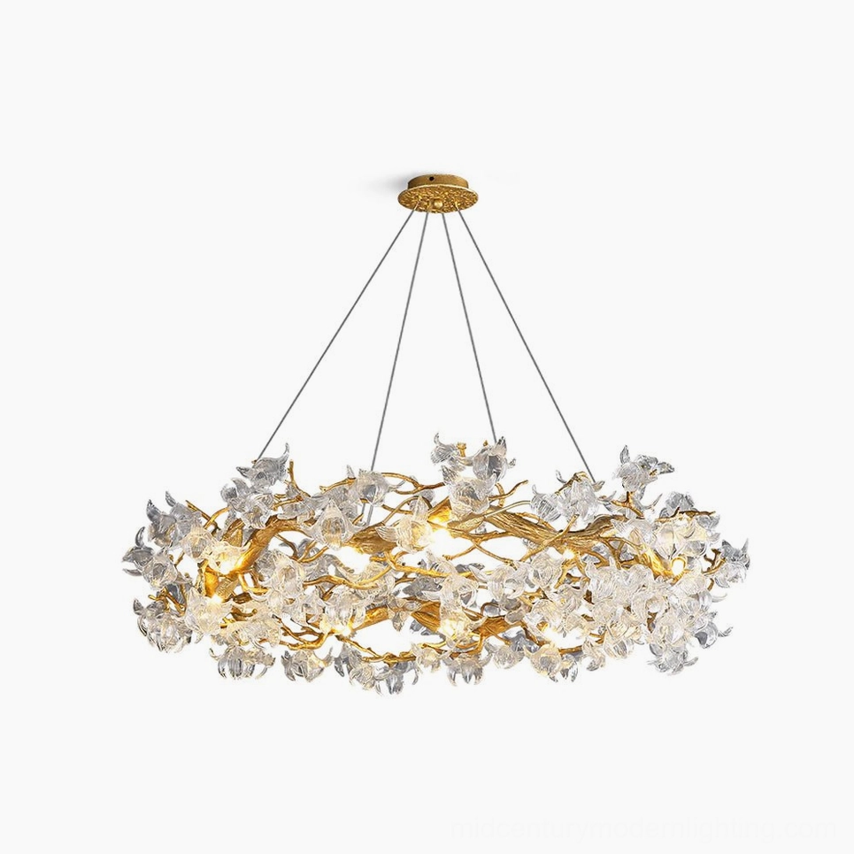 Hibiscus crystal chandelier with brass branches and clear flower petals overhead studio view on white background