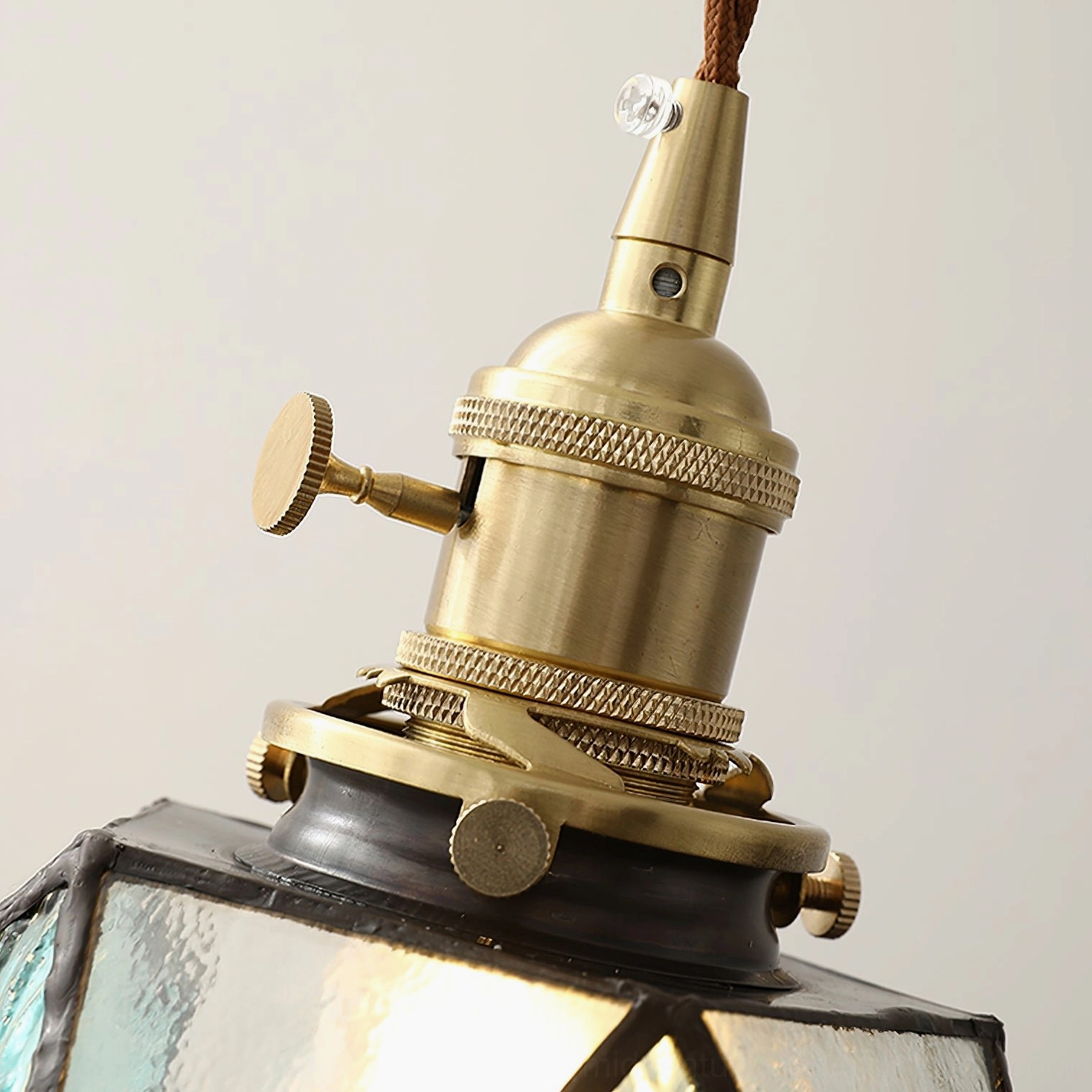 Hiro geometric pendant lamp styled in eclectic bohemian home decor, paired with vintage furniture and natural light