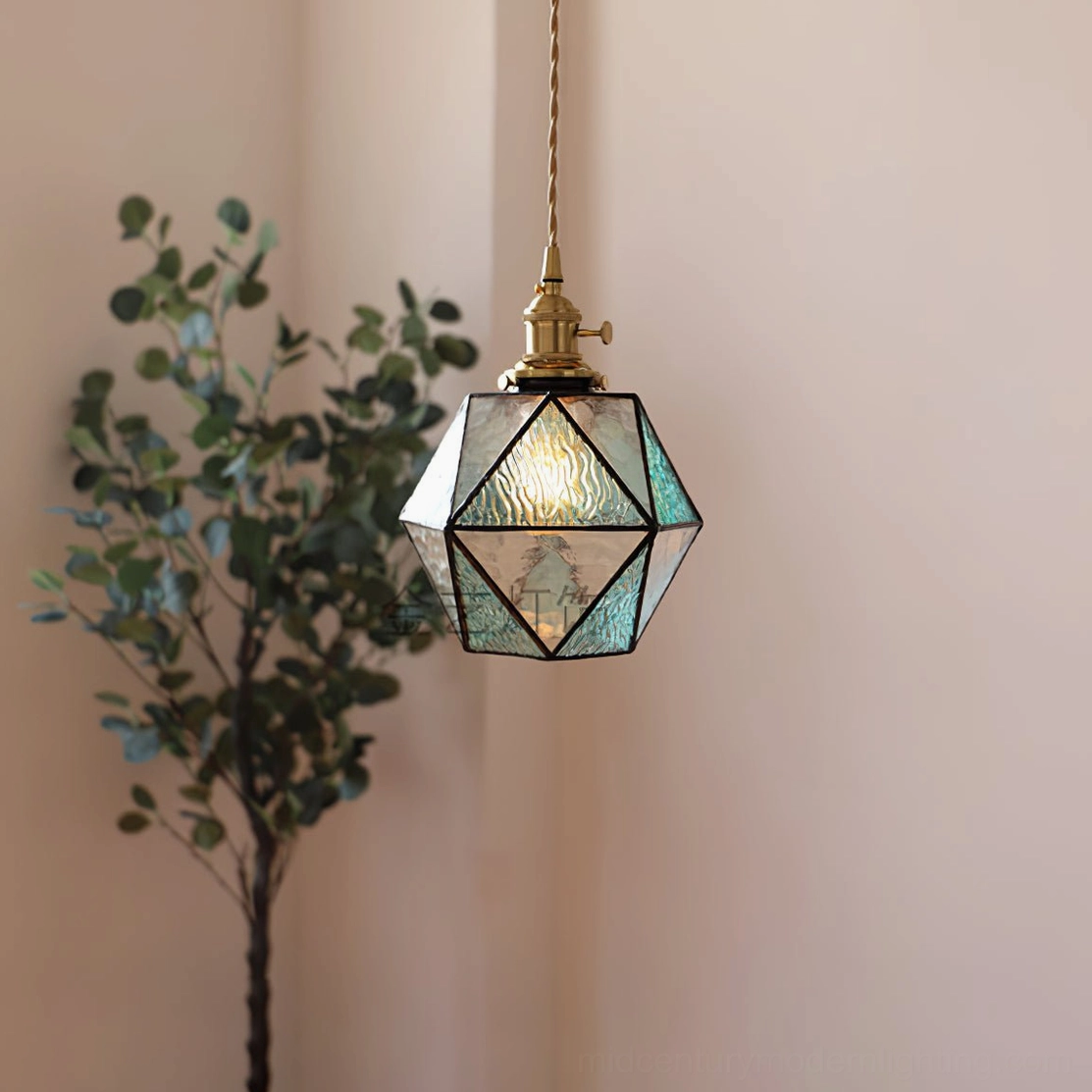 Hiro pendant lamp in contemporary minimalist dining room, single statement light fixture above table setting