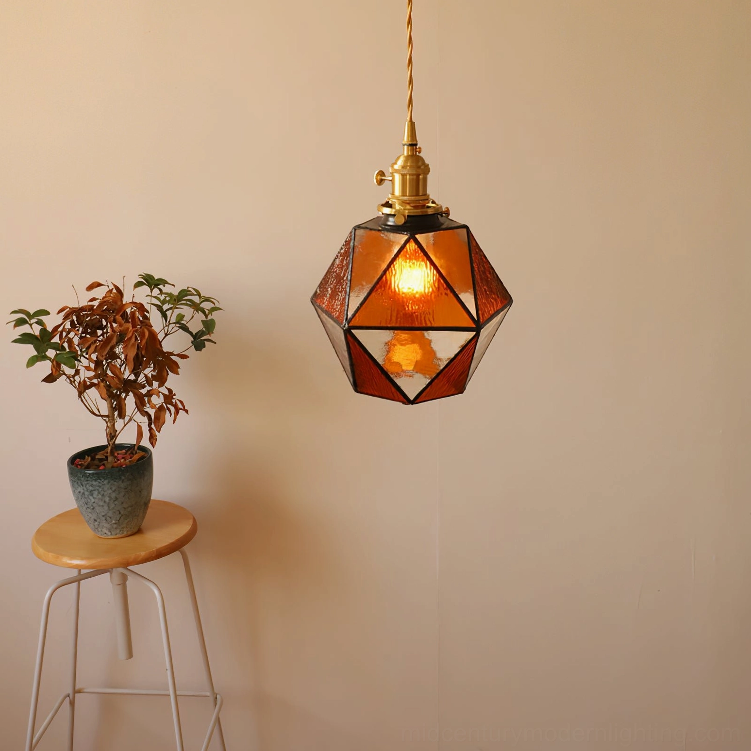 Hiro handcrafted pendant lamp multiple view angle, faceted geometric glass pattern and brass frame construction