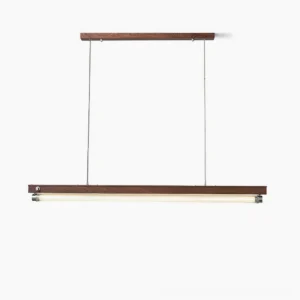 Hiromi linear pendant light in walnut wood finish suspended from adjustable cables against white studio background