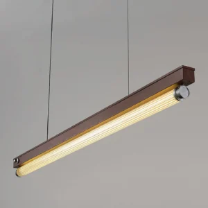 Side angle view of Hiromi mid-century modern pendant showing warm LED light diffusion through fluted acrylic