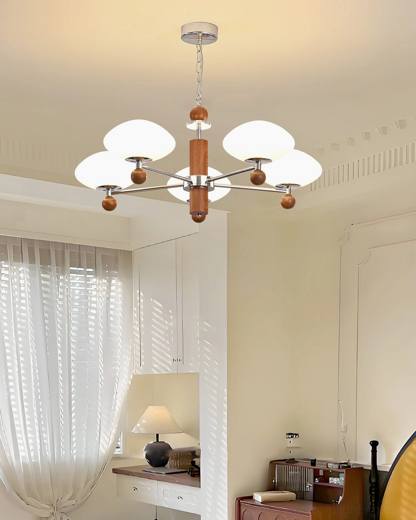 Soft warm home office with pointed chandelier - minimalist mid-century modern lighting with sheer curtains and vanity desk