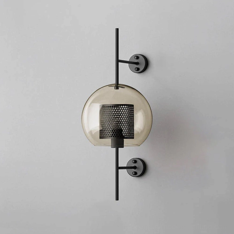 Modern honeycomb glass sconce with sculptural design and warm brass tones