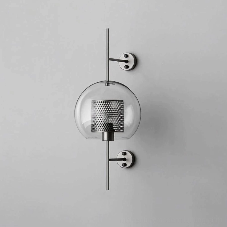 Honeycomb glass wall sconce with warm glow and refined architectural design