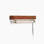 Hopper walnut plug-in wall sconce with integrated LED, frontal studio product view on white background