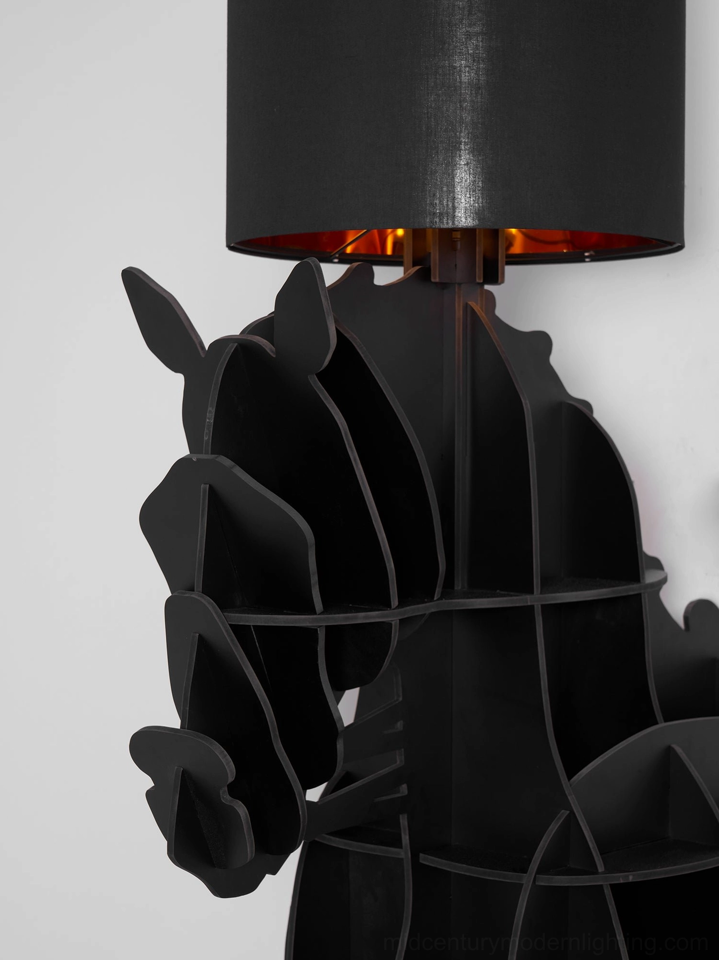 Sculptural horse floor lamp showing geometric abstraction and mid-century modern design influence