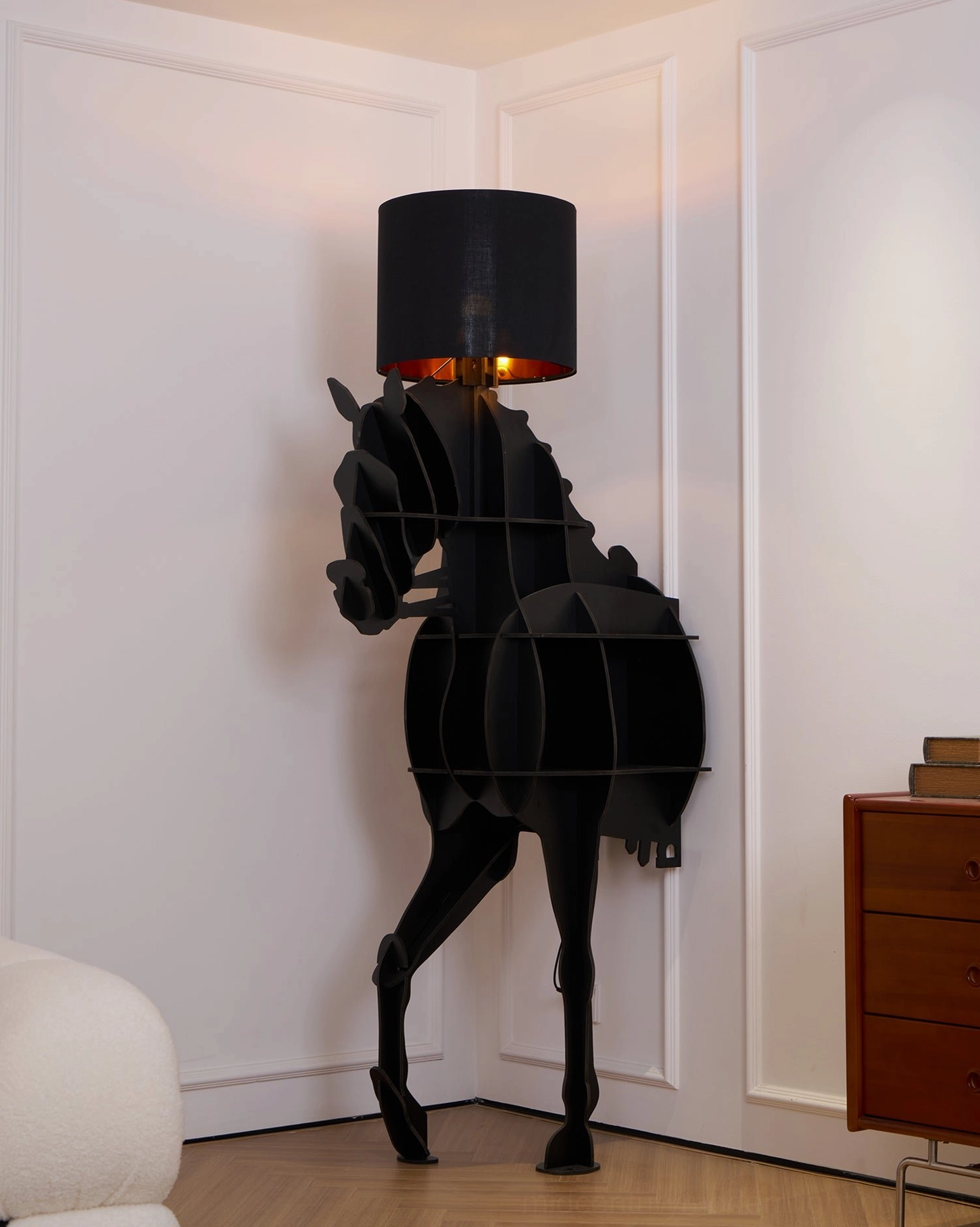 Sculptural horse floor lamp with matte black finish, studio display angle showing artistic equestrian form