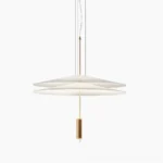 Hover Disc pendant chandelier with dual white translucent acrylic discs suspended on steel cables, gold metal hardware, isolated studio view