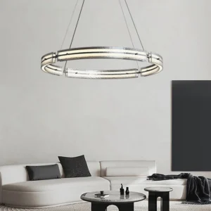 Modern minimalist living room with Hudson ring pendant light at eye level creating ambient illumination