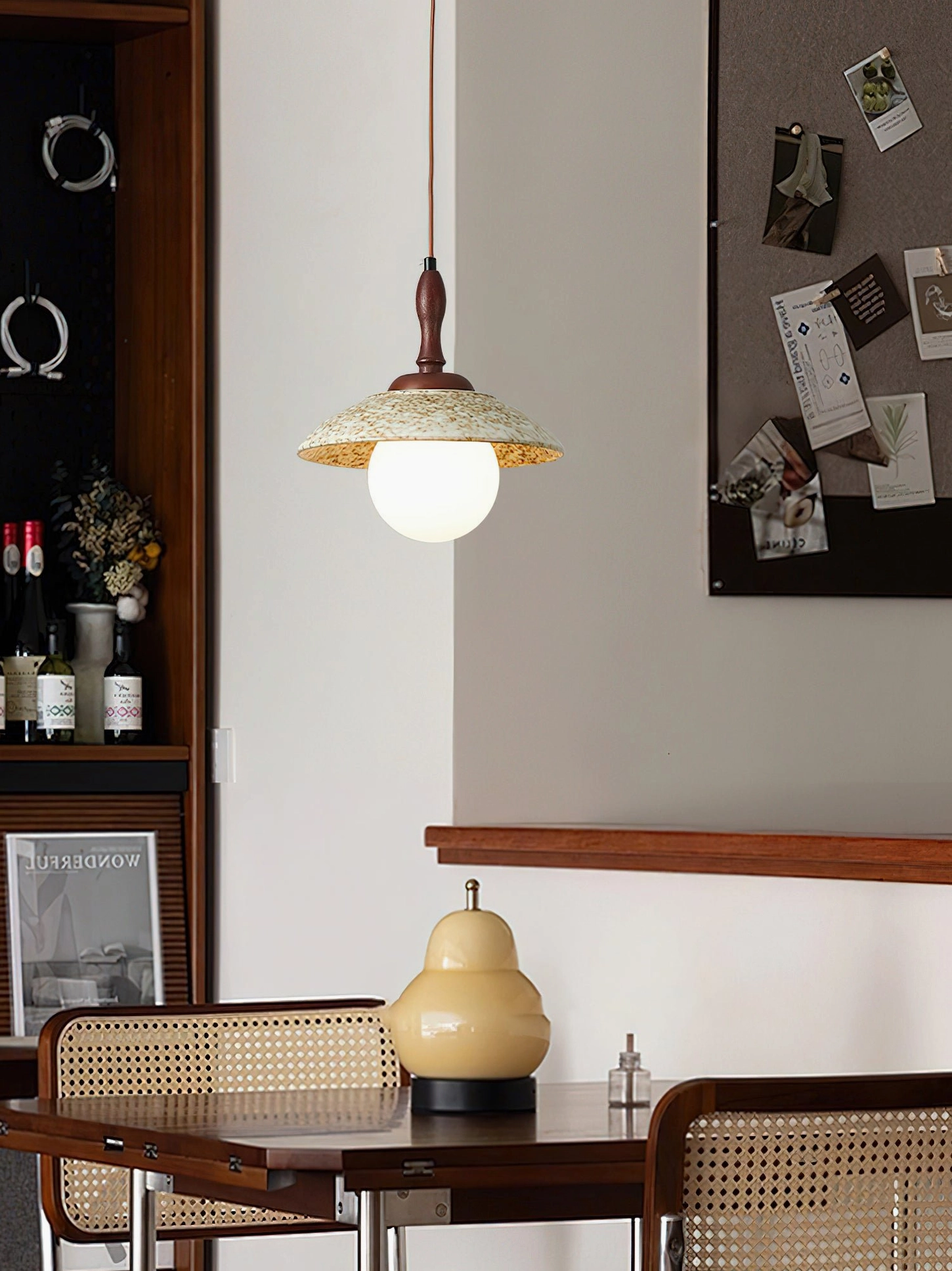 Humboldt mid-century pendant light in cozy dining corner with retro furnishings