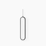 Huron oval pendant light single head minimalist black metal frame with glowing acrylic interior studio front view
