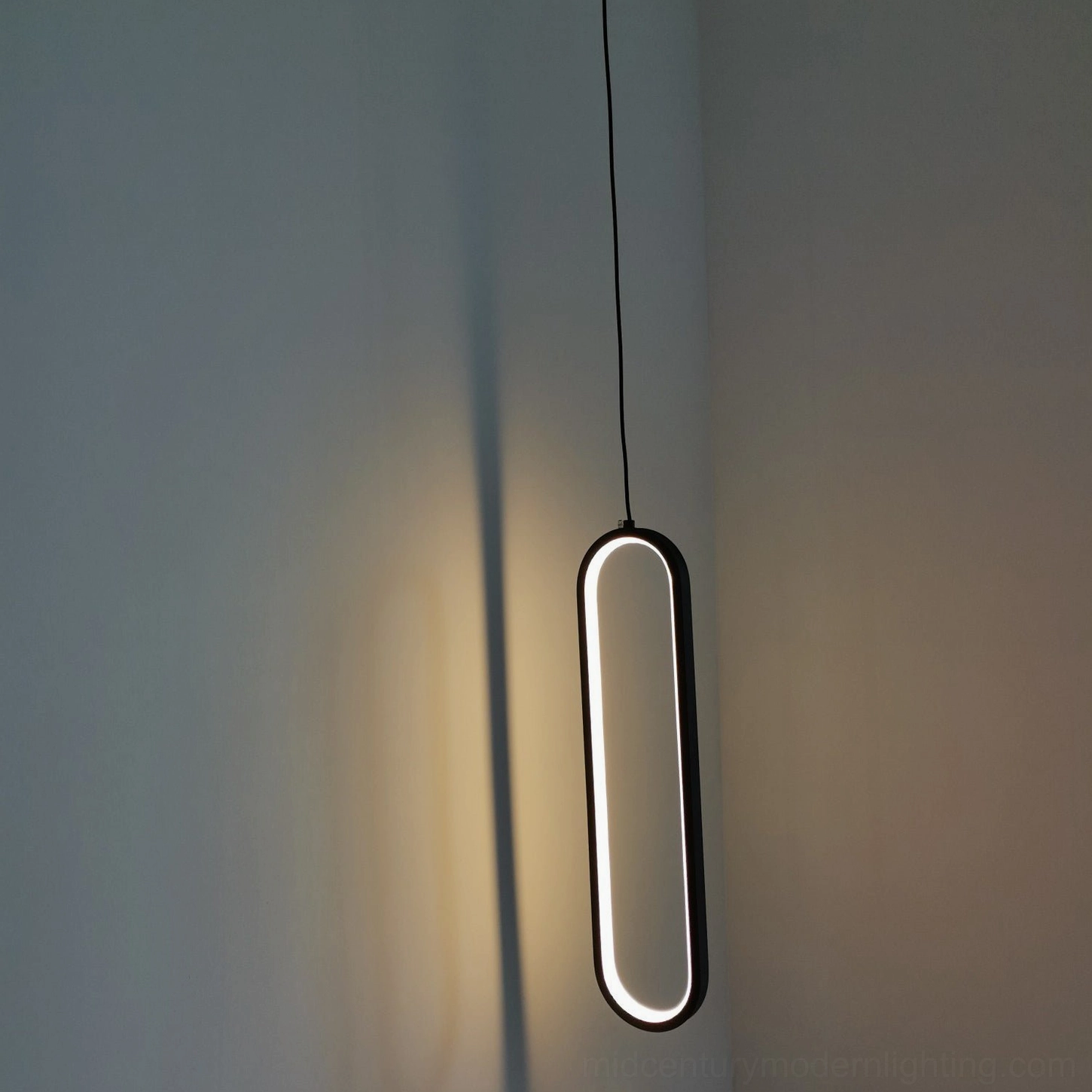 Huron pendant light minimalist metal oval silhouette modern home illumination