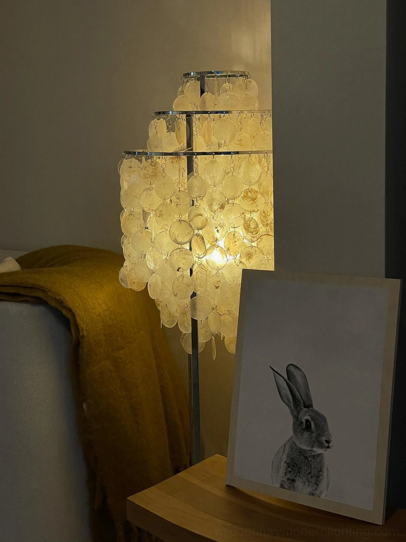Mother of pearl capiz shell floor lamp showing translucent shell quality when illuminated