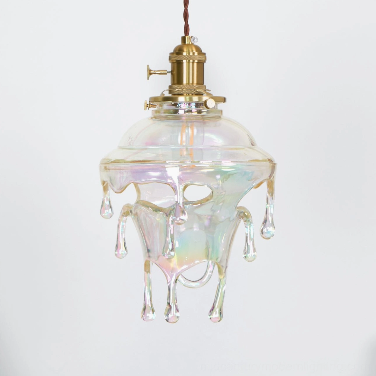 Water droplets pendant illuminated showing internal bulb glow and resin light refraction