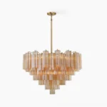 Imondo hand-blown Murano glass tubular chandelier with amber tones and gold frame - front studio view