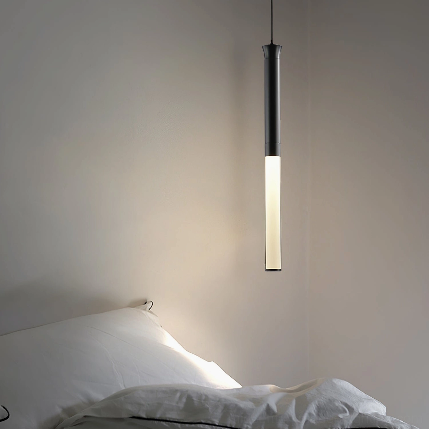 Individual Stick LED pendant light fixture with frosted white lamp tube and black frame assembly
