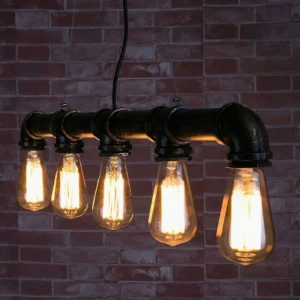 Vintage industrial water pipe design chandelier with 5 Edison bulbs against red brick wall