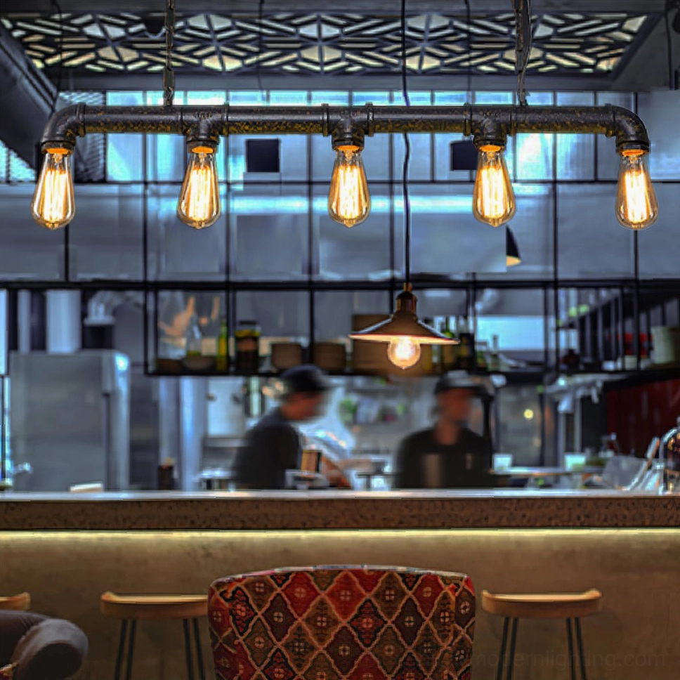 5-light industrial pipe pendant chandelier in restaurant bar counter with warm vintage aesthetic