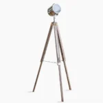 Industrial tripod floor lamp with adjustable spotlight head, polished chrome metal and camphor pine wood construction, front full-body view on white background