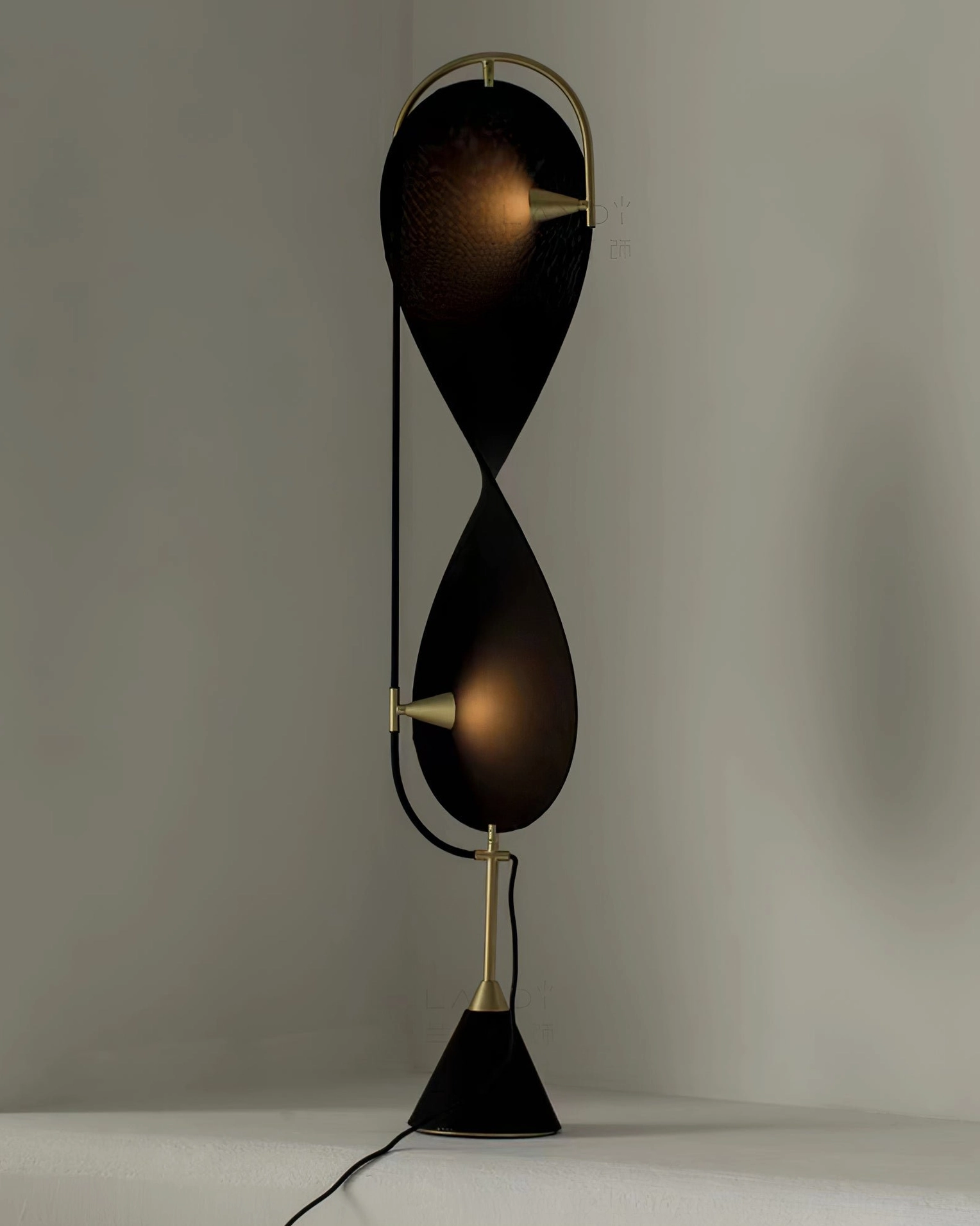 Infinite Floor Lamp creating gallery-like ambient lighting in sophisticated interior design setting