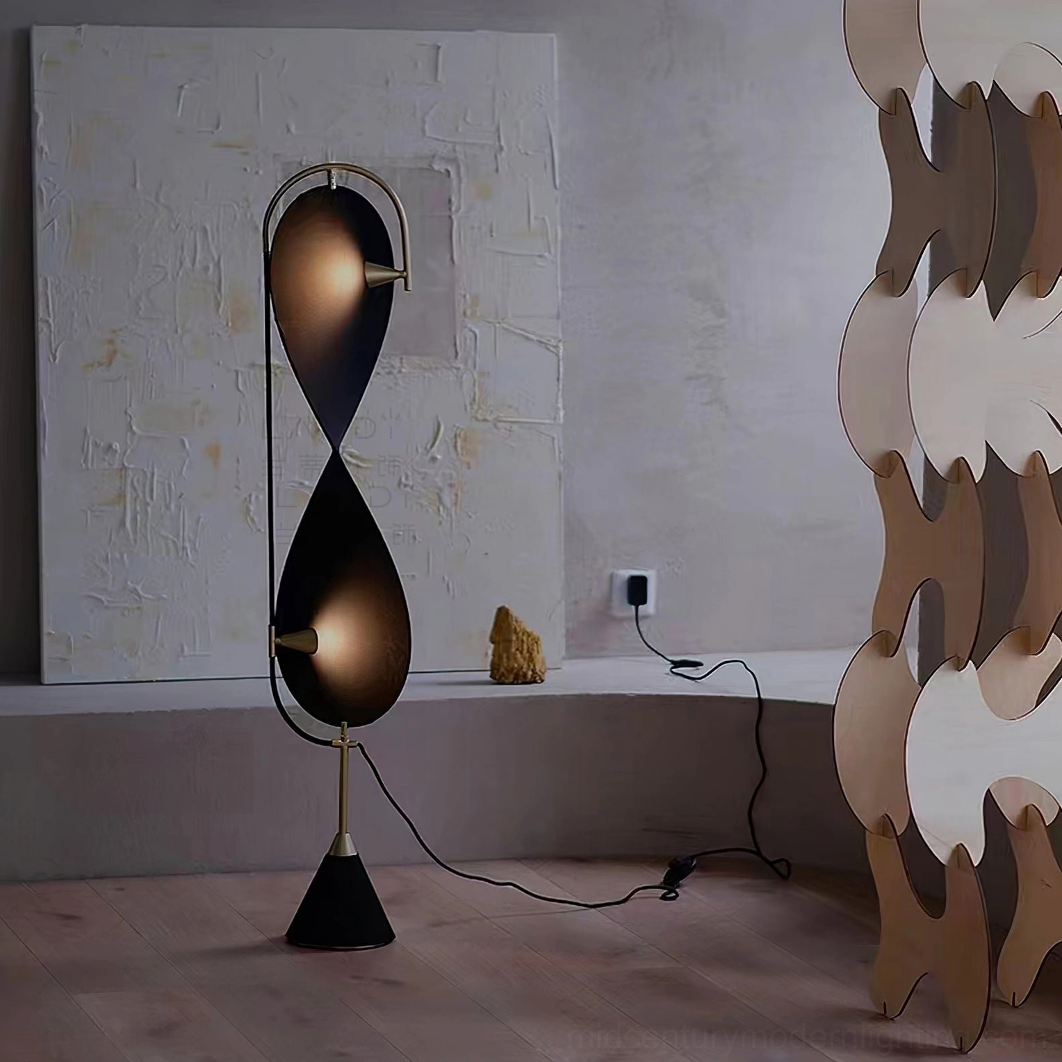 Infinite Floor Lamp in industrial rustic room with black and brass gold hardware, dual uplights and concrete wall backdrop