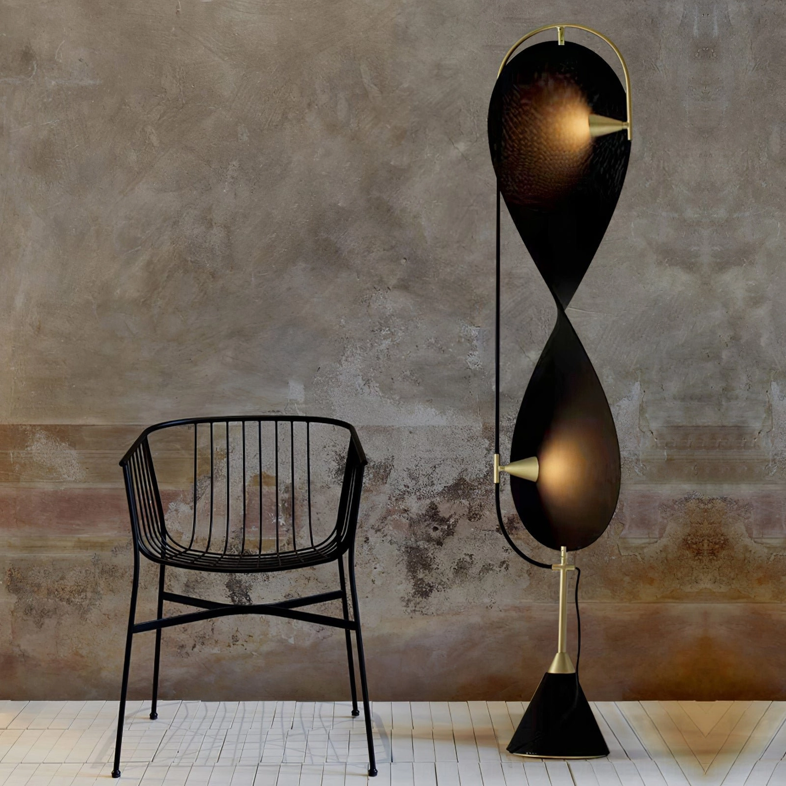 Sculptural Infinite Floor Lamp with matte black metal frame and fabric shades in minimalist art living space