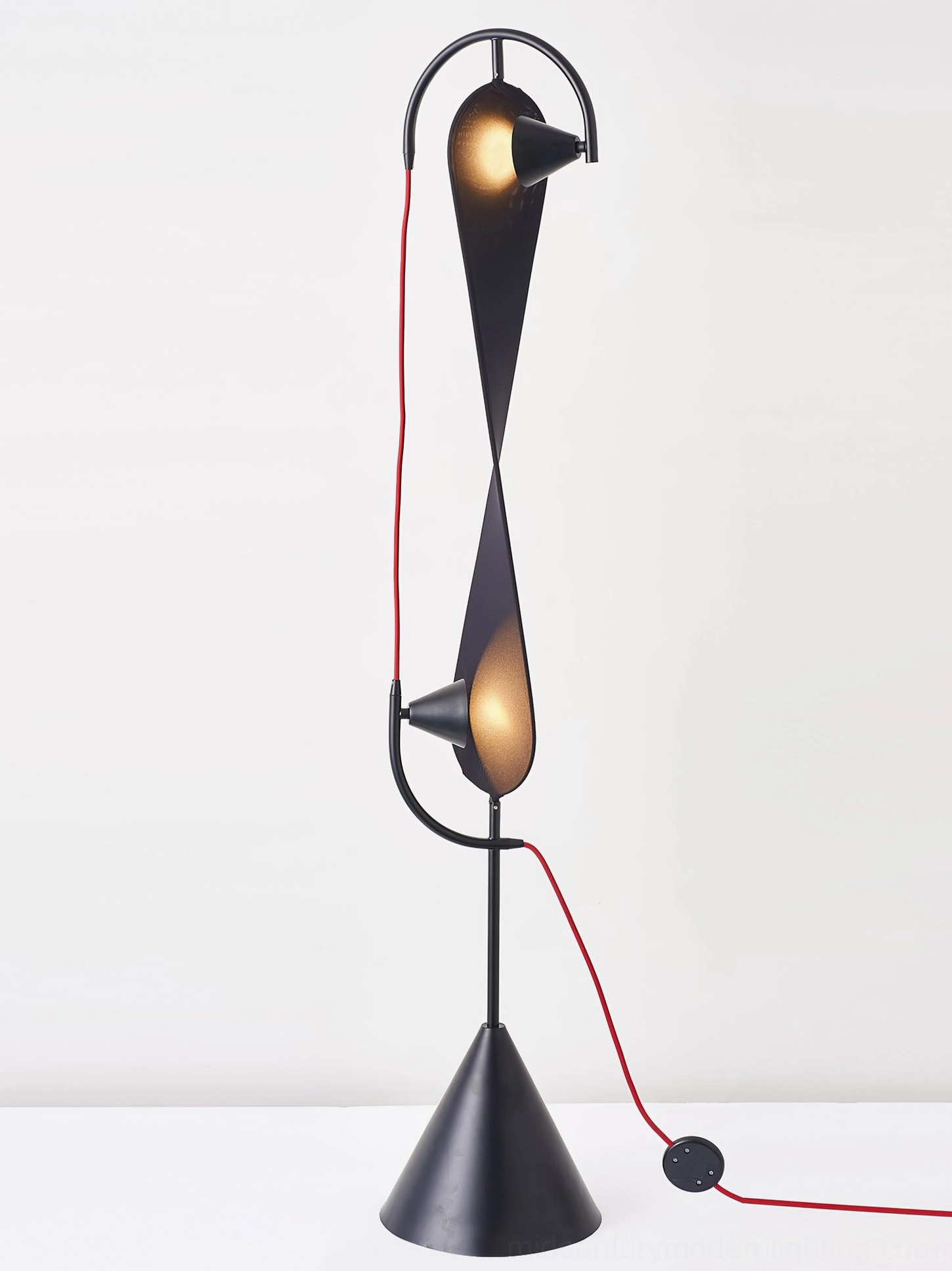 Infinite Floor Lamp silhouette showcasing iconic infinity symbol shape and artistic light distribution