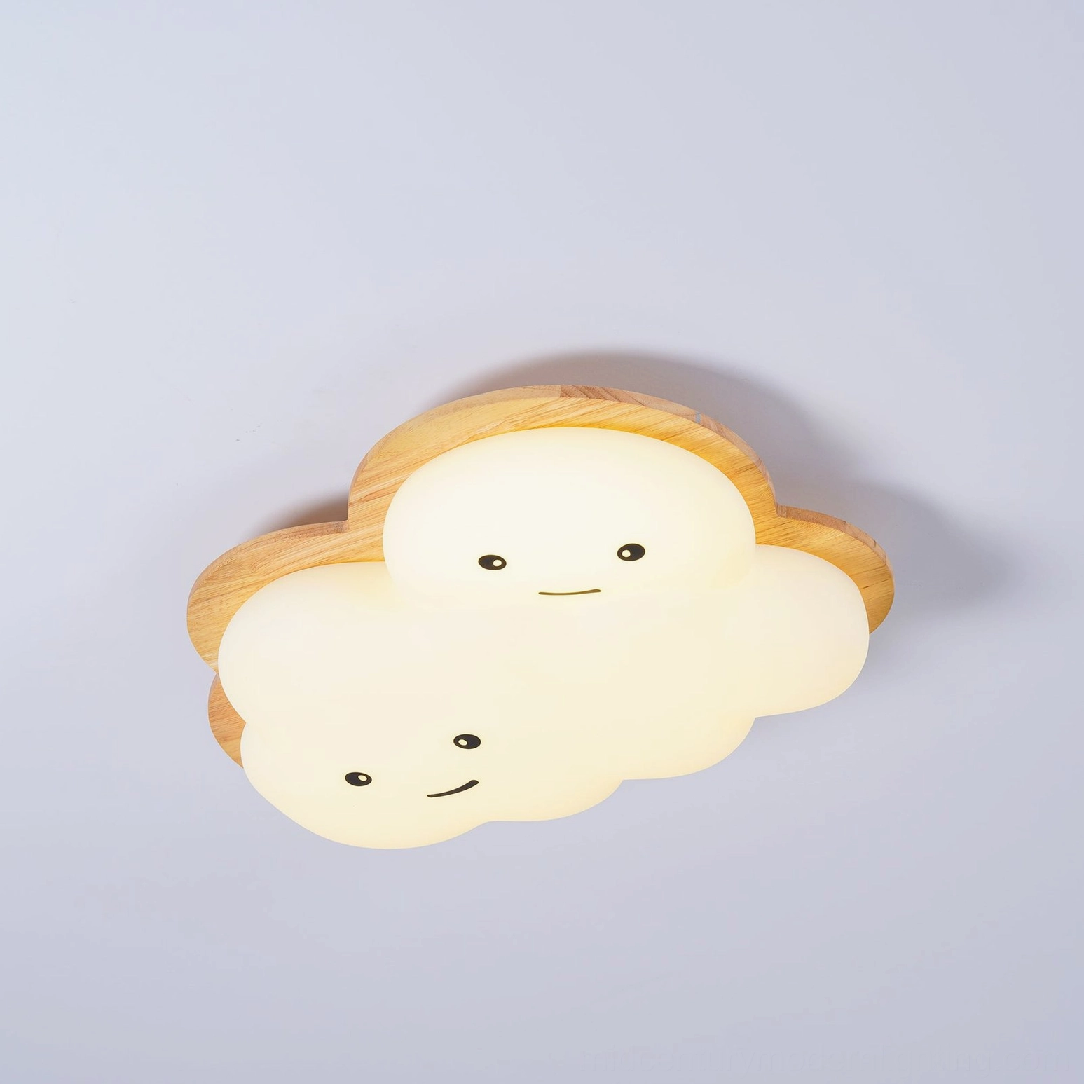 Installed smiling cloud ceiling lamp in modern contemporary kids room with warm ambient glow