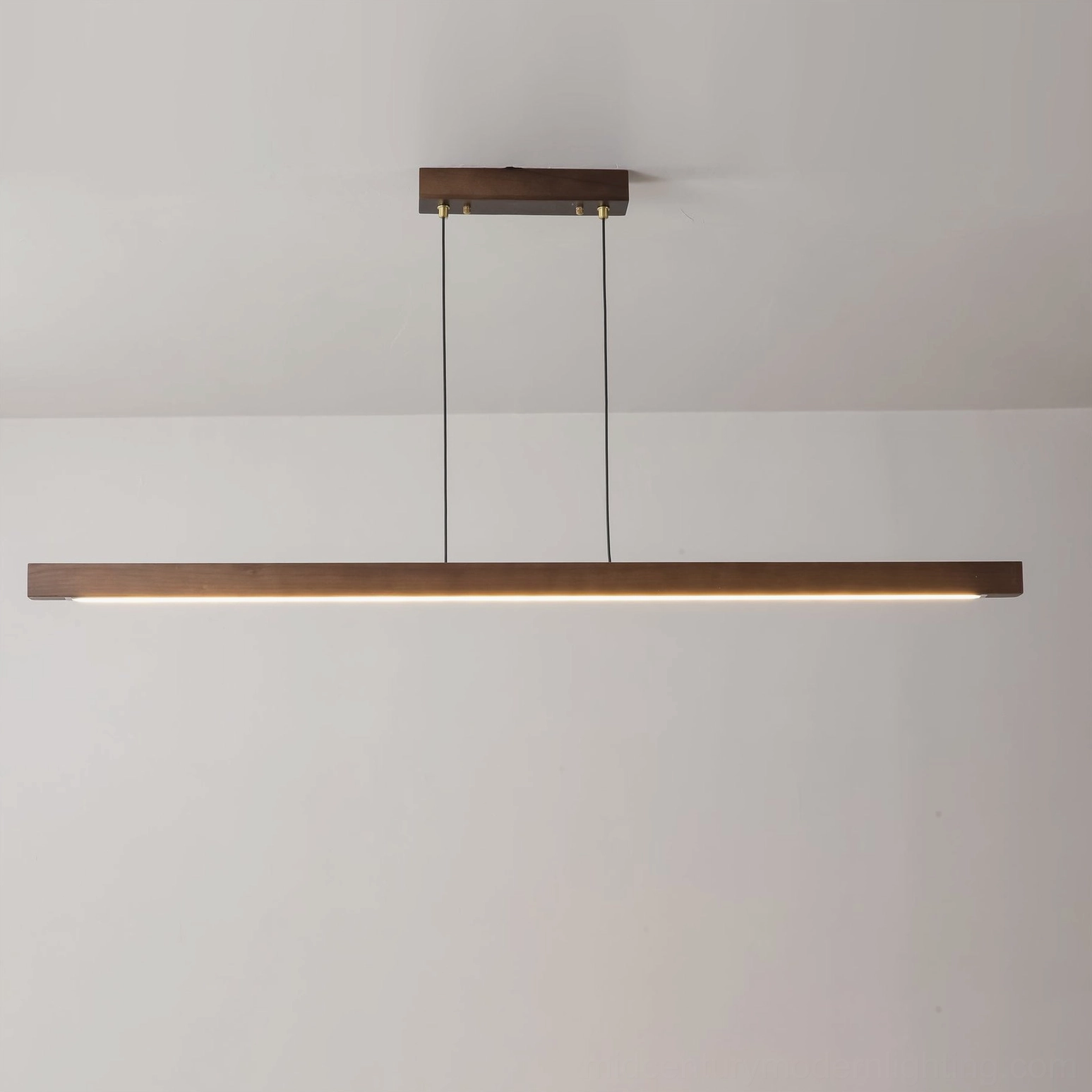 Natural wood linear LED pendant light fixture showing integrated LED strip and uniform warm illumination