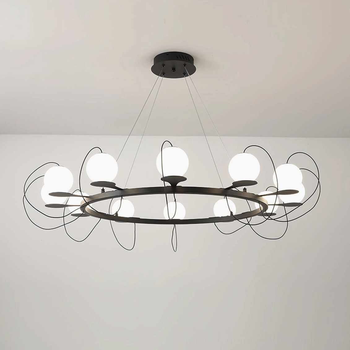 Magnetic bubble chandelier featuring interchangeable frosted glass globes and matte black suspension