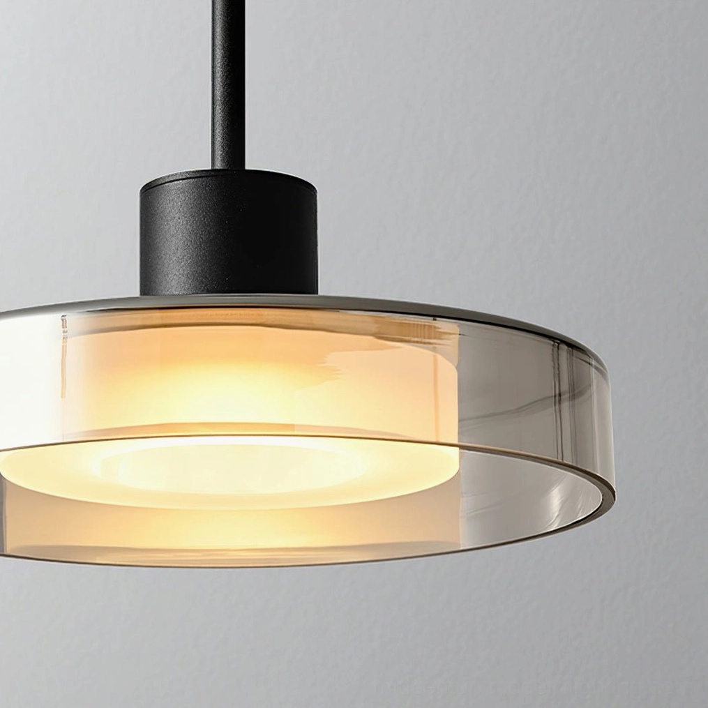 Iris pendant light fixture mounted in contemporary interior with neutral color palette